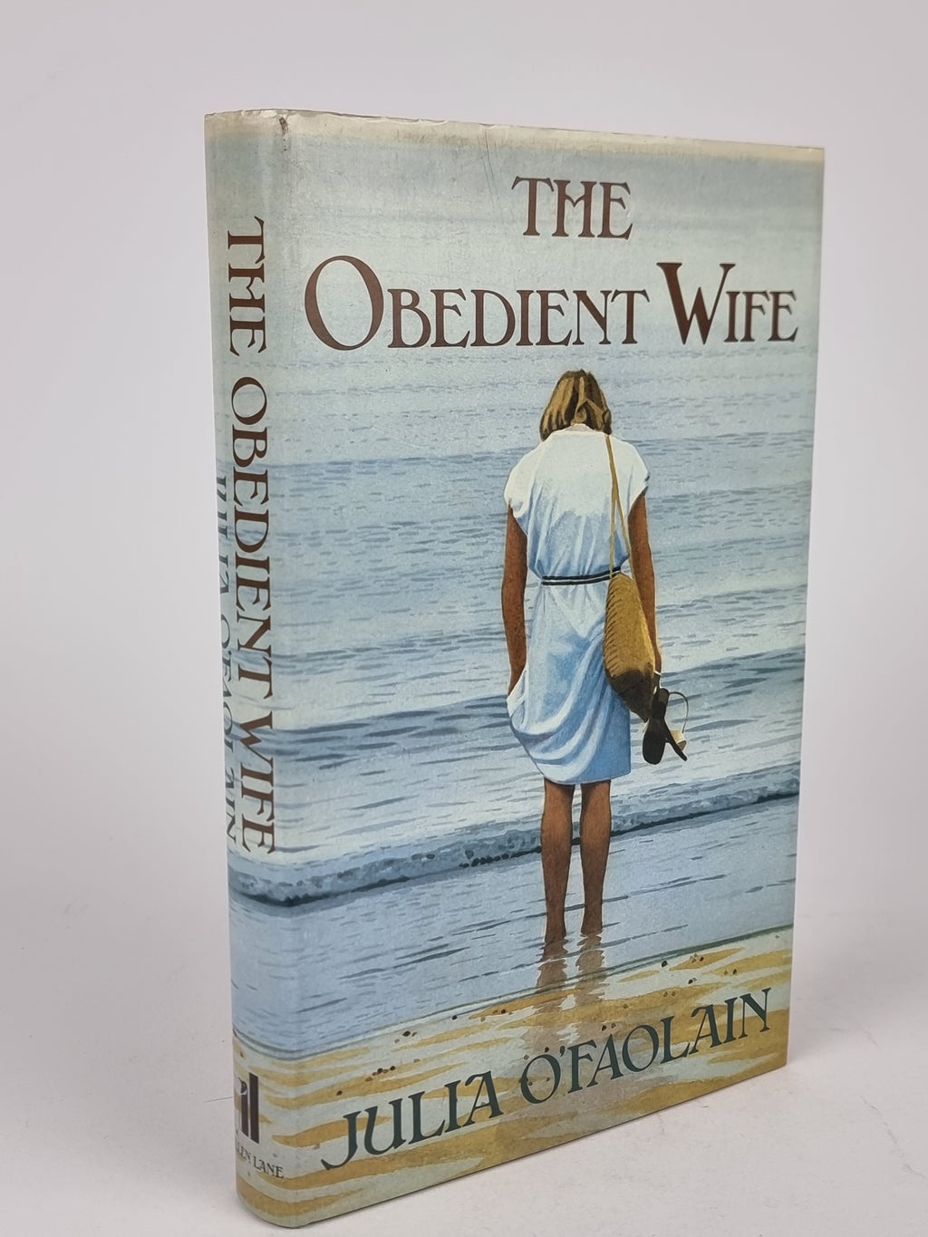 The Obedient Wife, Julia Ofaolain — 1st Edition