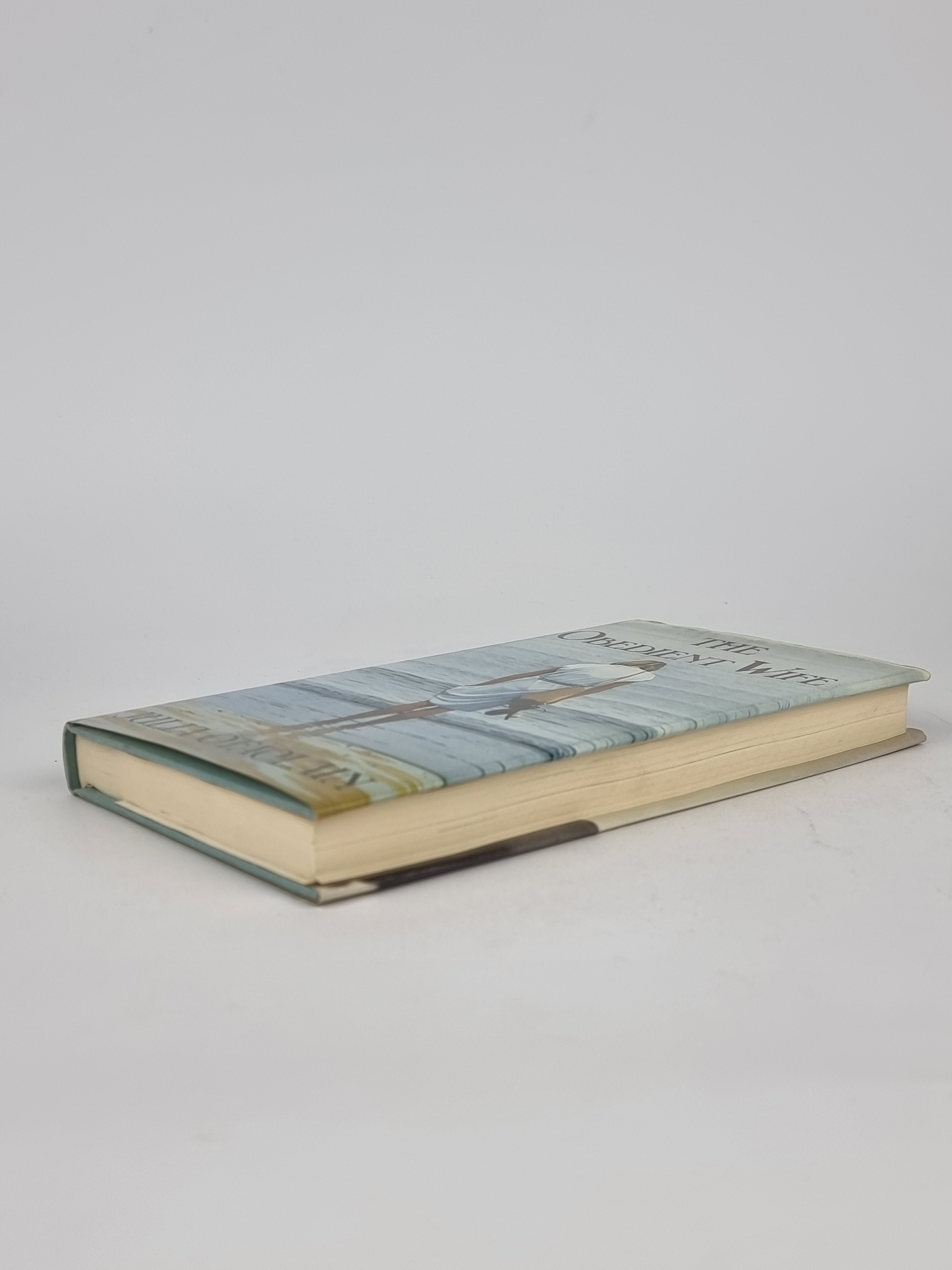 The Obedient Wife, Julia Ofaolain — 1st Edition