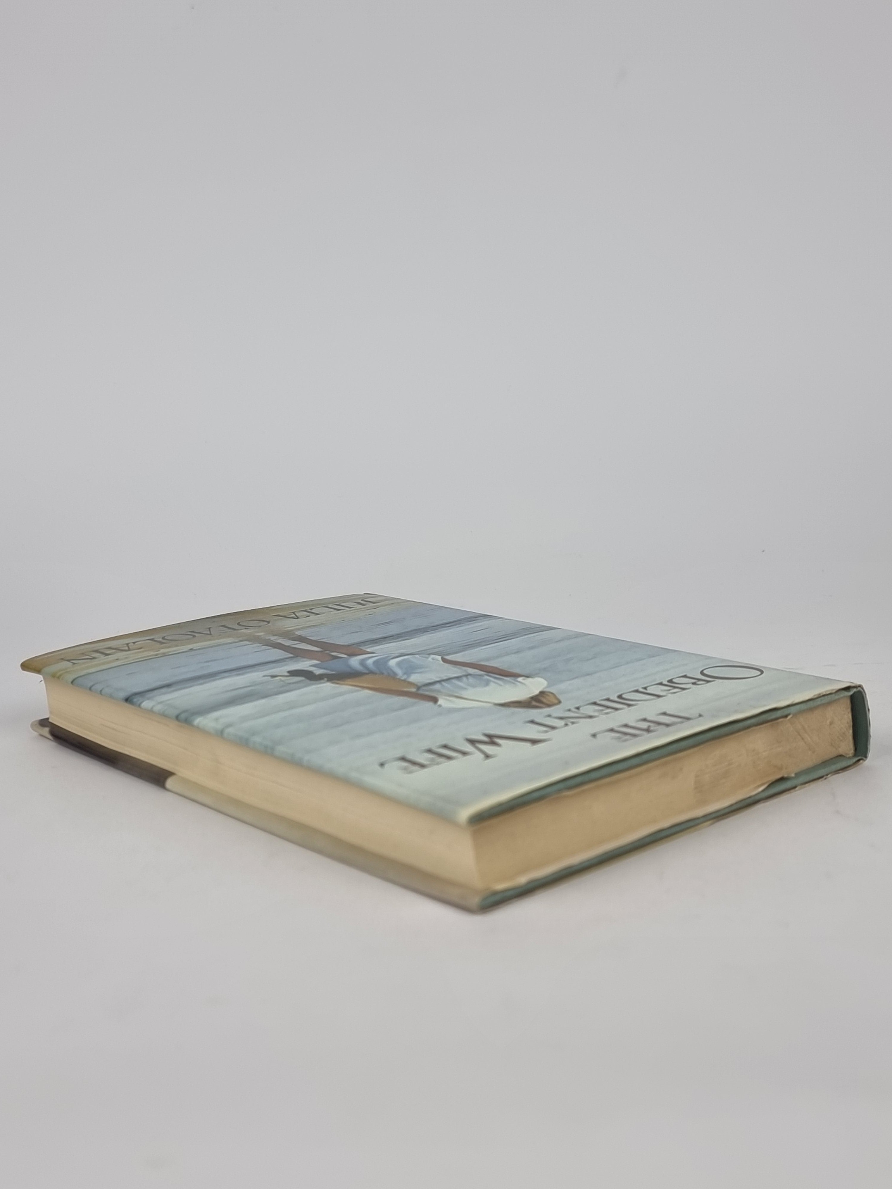 The Obedient Wife, Julia Ofaolain — 1st Edition
