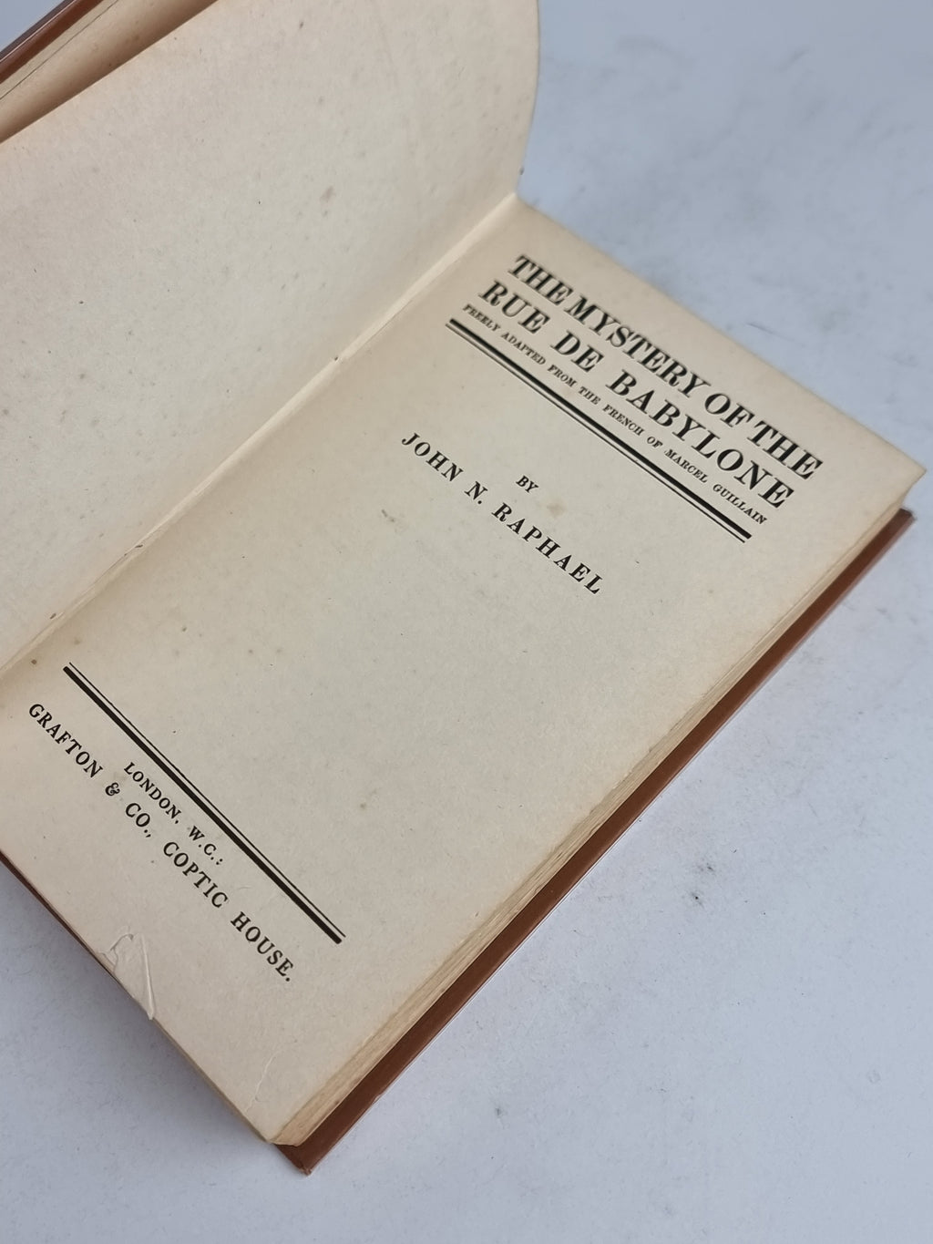 The Mystery of the Rue de Babylone, John N. Raphael — 1st Edition