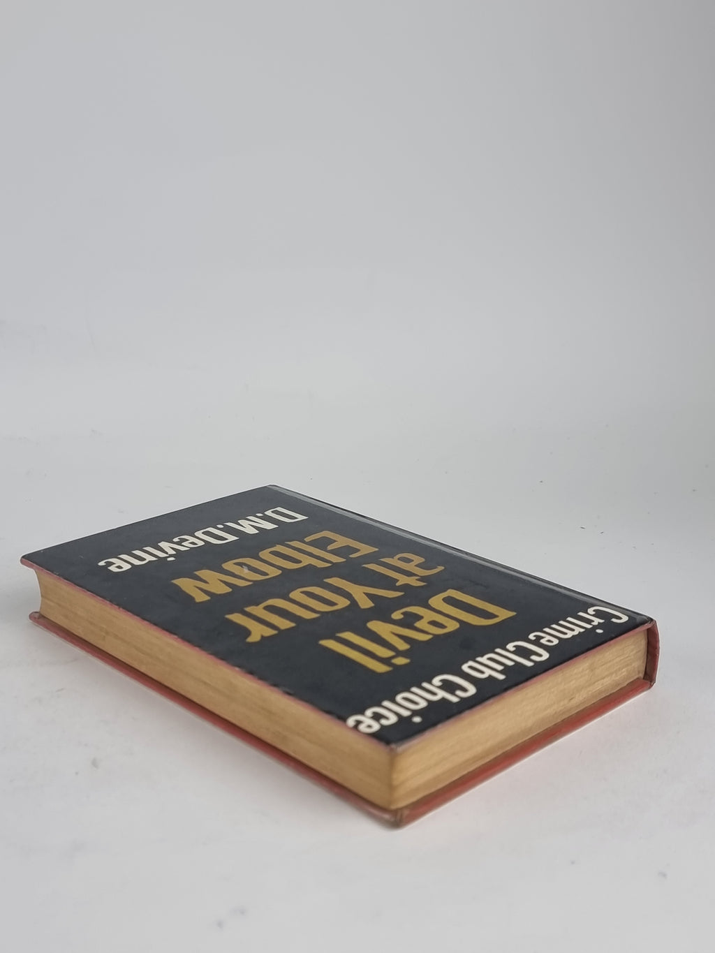 Devil at Your Elbow, D. M. Devine — 1st Edition