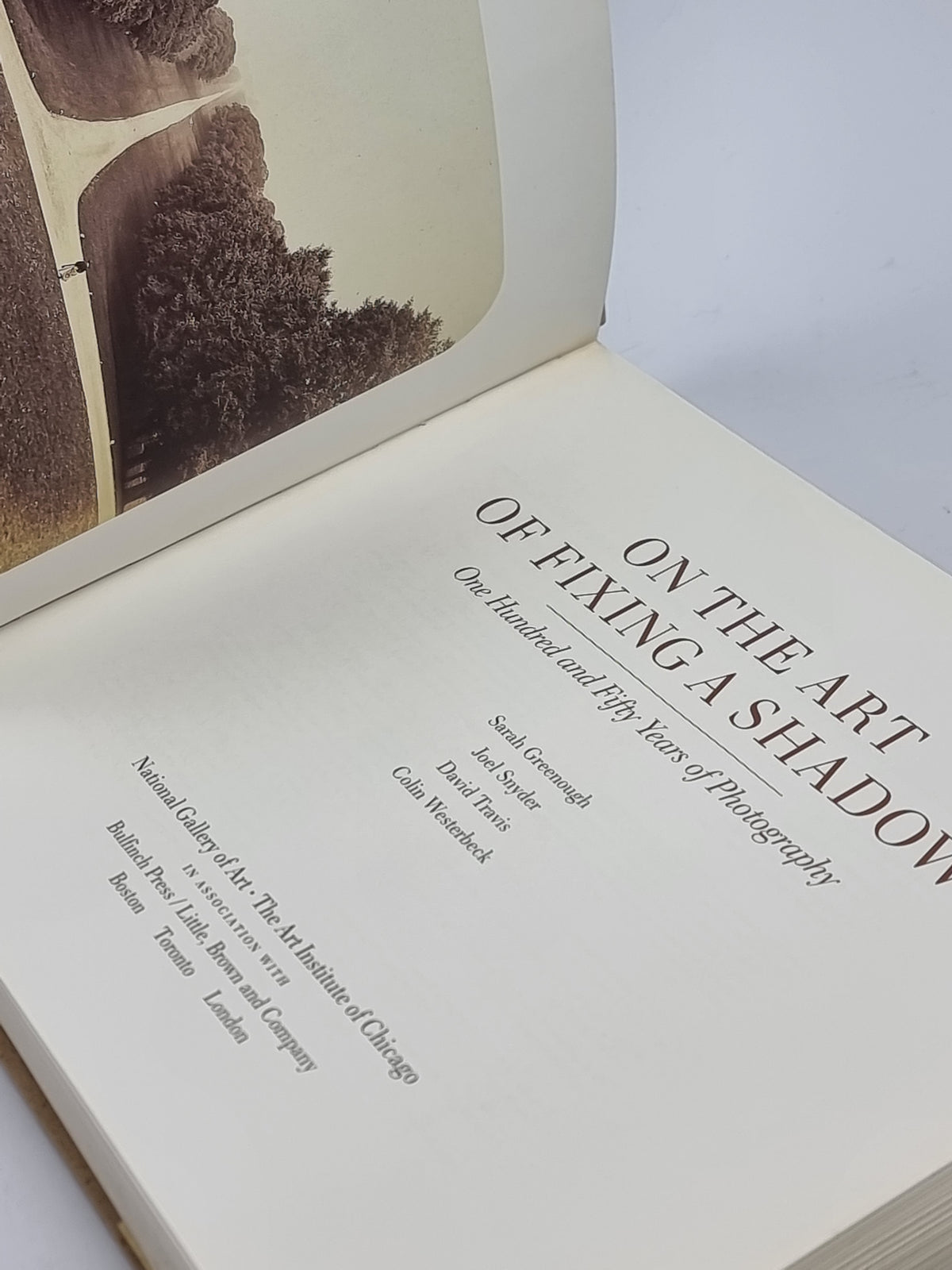 On the Art of Fixing a Shadow: One Hundred and Fifty Years of Photography
