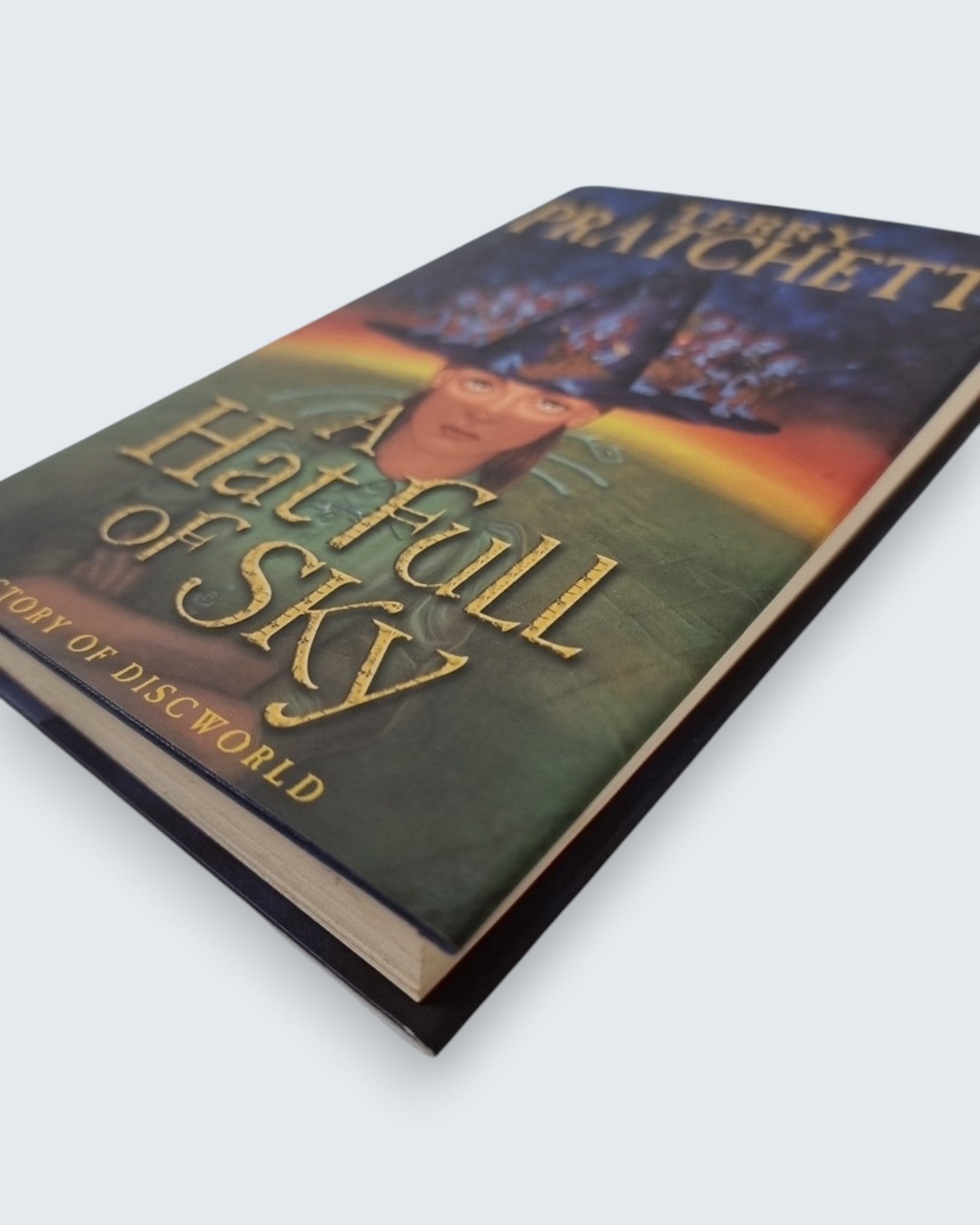 A Hat Full of Sky Terry Pratchett first edition vintage book laying angled view