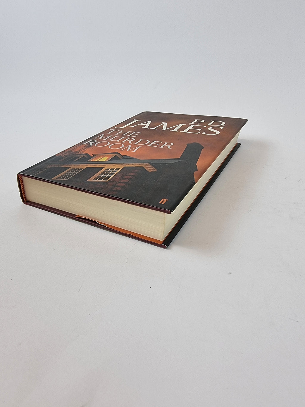 The Murder Room P D James first edition vintage book angled view