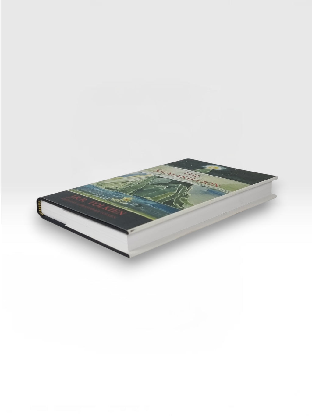 Broadhursts Books The Silmarillion by J.R.R. Tolkien, edited by Christopher Tolkien. Hardcover book with illustrated dust jacket.
