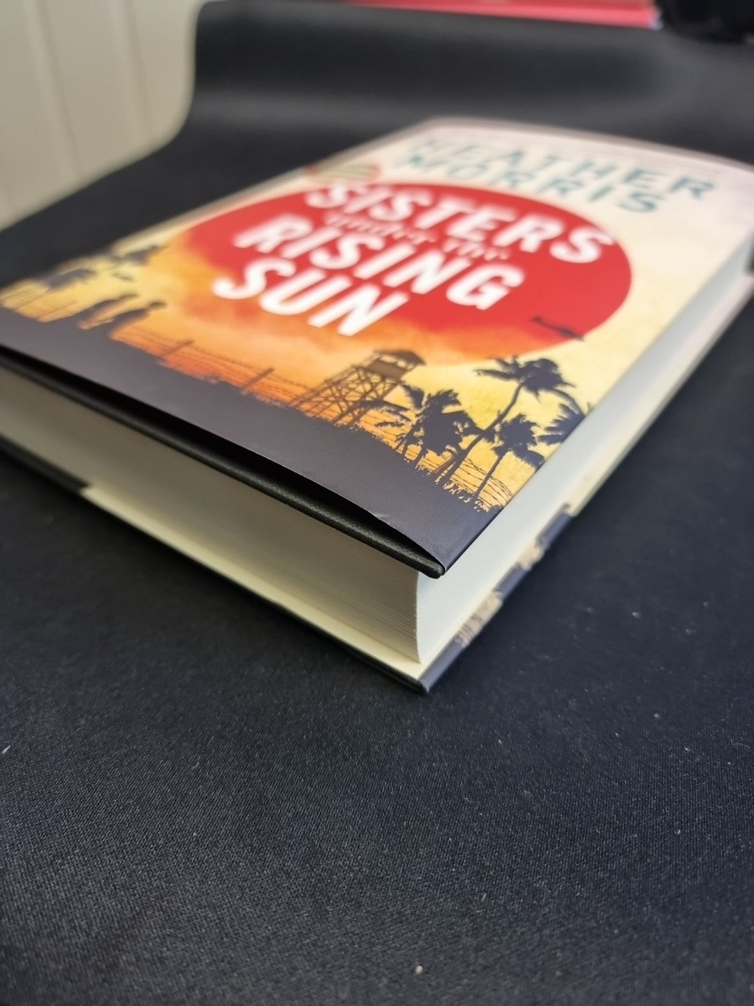 *SIGNED BY AUTHOR*  Sisters under the Rising Sun by Heather Morris