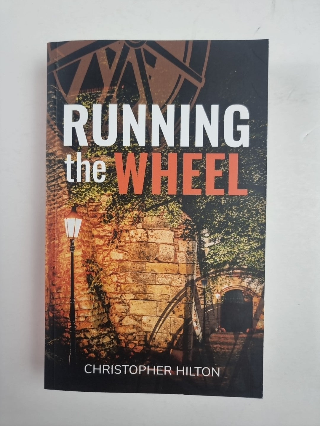 Running the Wheel by Christopher Hilton Paperback Book 