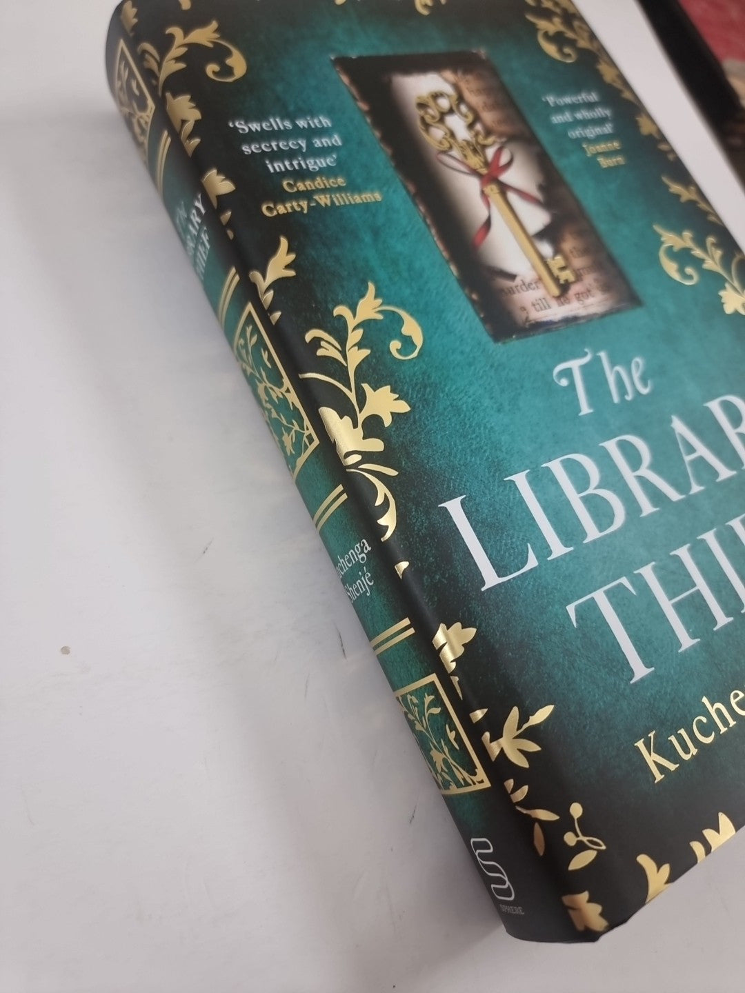 The Library Thief: The Binding meets The Vanishing Half 