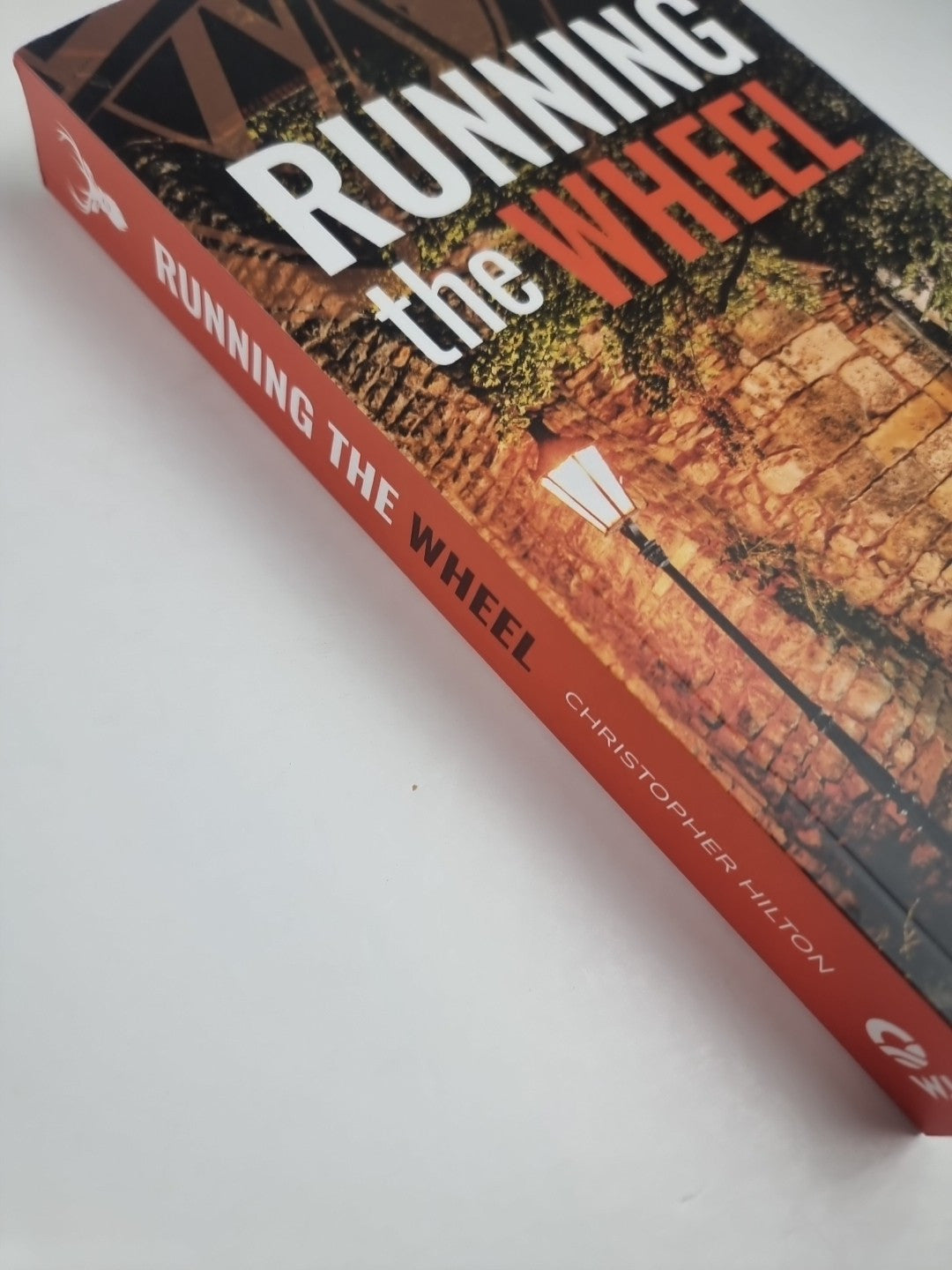 Running the Wheel by Christopher Hilton Paperback Book 